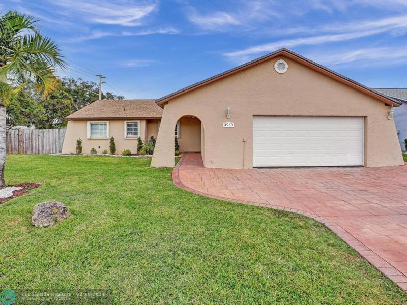 First Photo for Home For Sale at 4950 NW 85th Ter Lauderhill, FL. 33351
