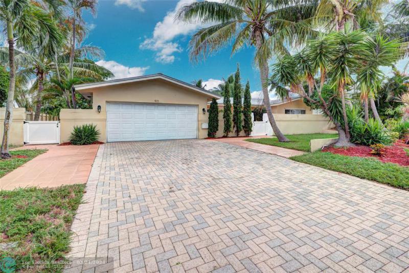 First Photo for Home For Sale at 911 SE 11th St Deerfield Beach, FL. 33441