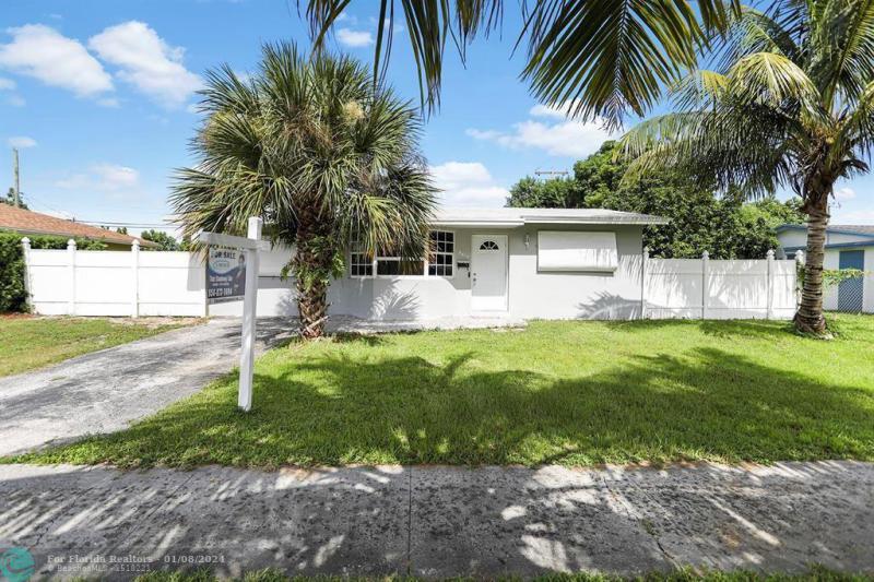 First Photo for Home For Sale at 2610 NW 43rd Ter Lauderhill, FL. 33313