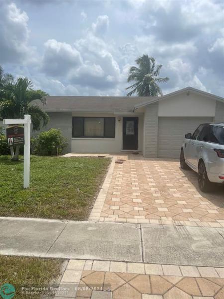 First Photo for Home For Sale at 372 NW 19th Ct Pompano Beach, FL. 33060