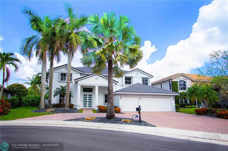 First Photo for Home For Sale at 1702  Victoria Pointe Cir Weston, FL. 33327