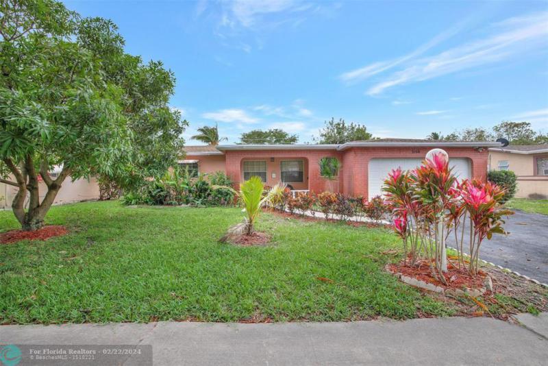 First Photo for Home For Sale at 3156 NW 42nd St Lauderdale Lakes, FL. 33309