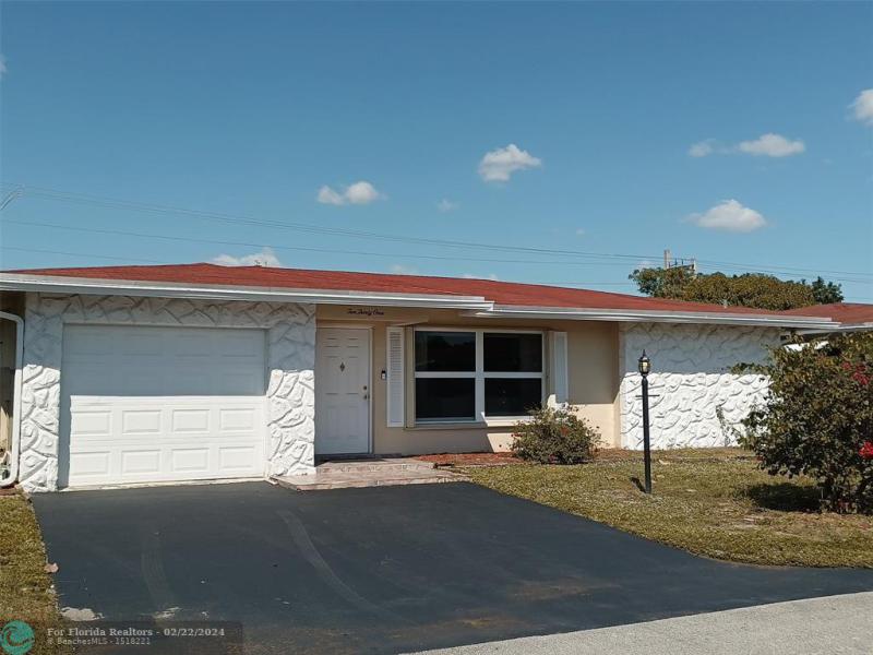 First Photo for Home For Sale at 1031 NW 49th St Deerfield Beach, FL. 33064