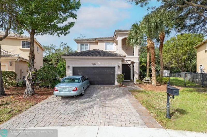 First Photo for Home For Sale at 4971  Cypress way Coconut Creek, FL. 33073