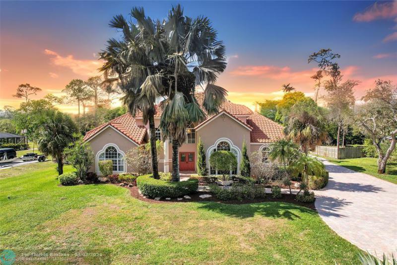 First Photo for Home For Sale at 6213 NW 63rd Way Parkland, FL. 33067