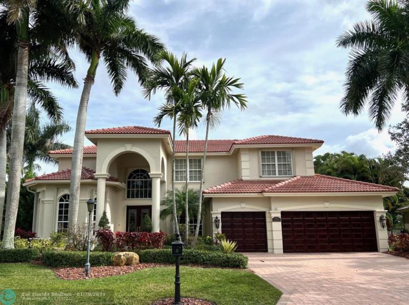 First Photo for Home For Sale at 6143 NW 120 TERRACE Coral Springs, FL. 33076