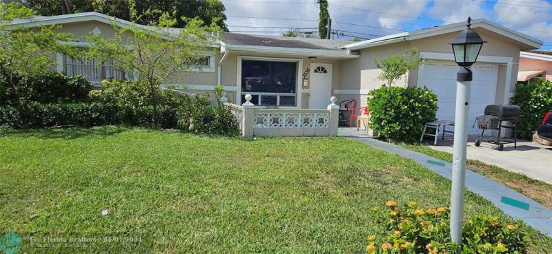 First Photo for Home For Sale at 3536 NW 32nd St Lauderdale Lakes, FL. 33309