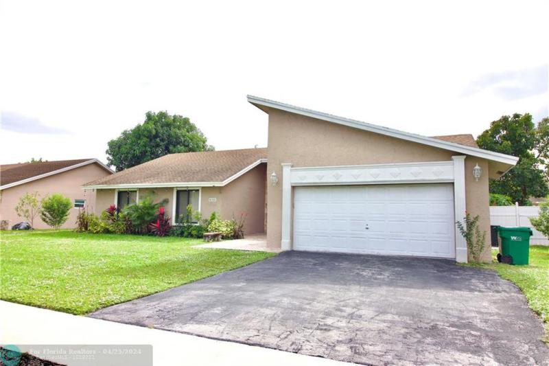 First Photo for Home For Sale at 8310 NW 54th Ct Lauderhill, FL. 33351