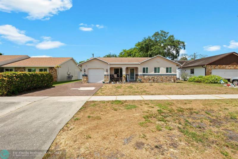 First Photo for Home For Sale at 8409 SW 19th St North Lauderdale, FL. 33068