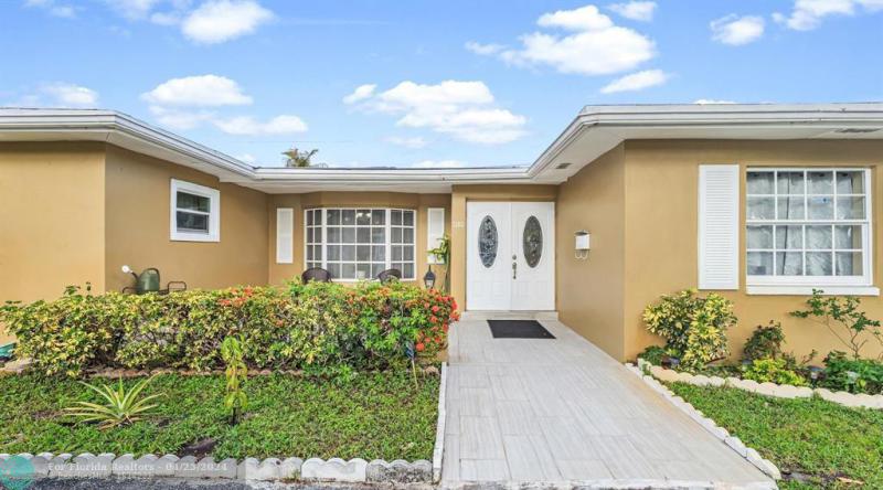 First Photo for Home For Sale at 2180 NW 32nd Ter Lauderdale Lakes, FL. 33311