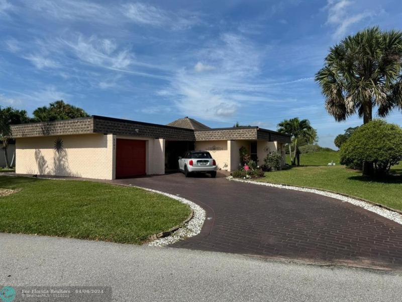 First Photo for Home For Sale at 5107  Bayberry Ln Tamarac, FL. 33319