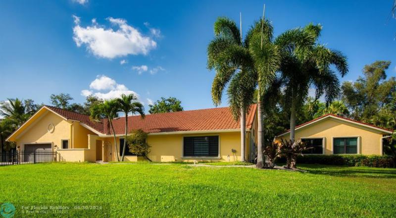 First Photo for Home For Sale at 12351 NW 2nd St Plantation, FL. 33325