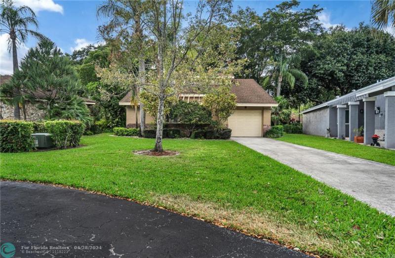 First Photo for Home For Sale at 2441  Ginger Ave Coconut Creek, FL. 33063