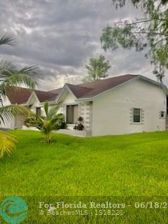  Single Family Homes Photo 8: 7177 NW 49th St  Lauderhill,  FL 33319
