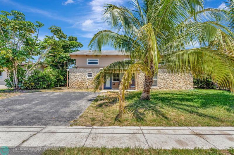 First Photo for Home For Sale at 4441  NW 37th Lauderdale Lakes, FL. 33319