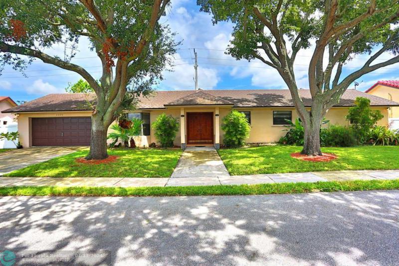 First Photo for Home For Sale at 6000 NW Paradise Pl Tamarac, FL. 33321