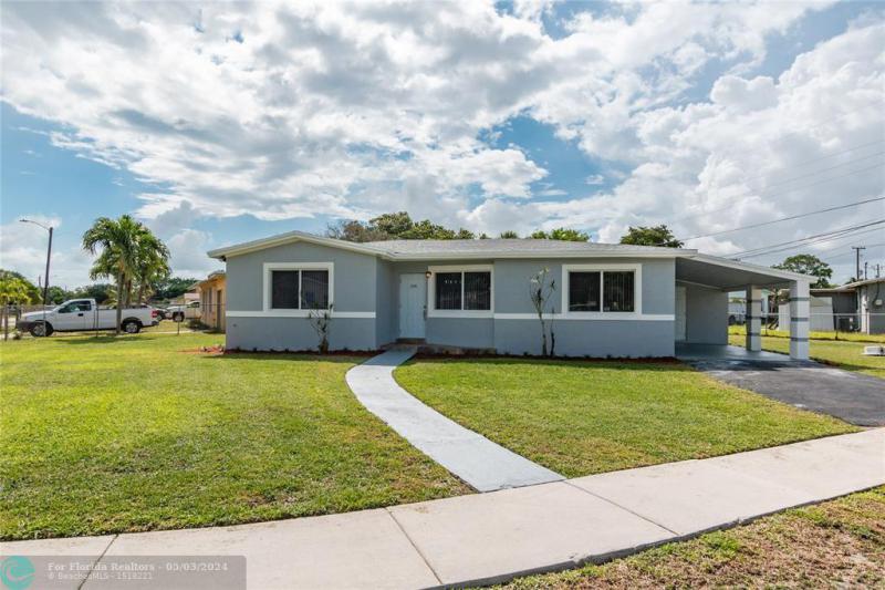 First Photo for Home For Sale at 3480 NW 1st Ct Lauderhill, FL. 33311