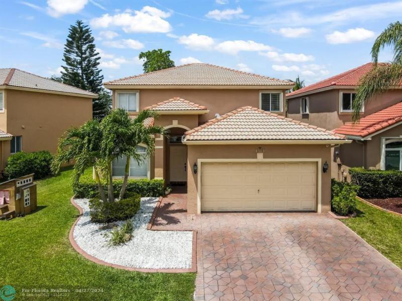 First Photo for Home For Sale at 3775  Pebblebrook Ct Coconut Creek, FL. 33073