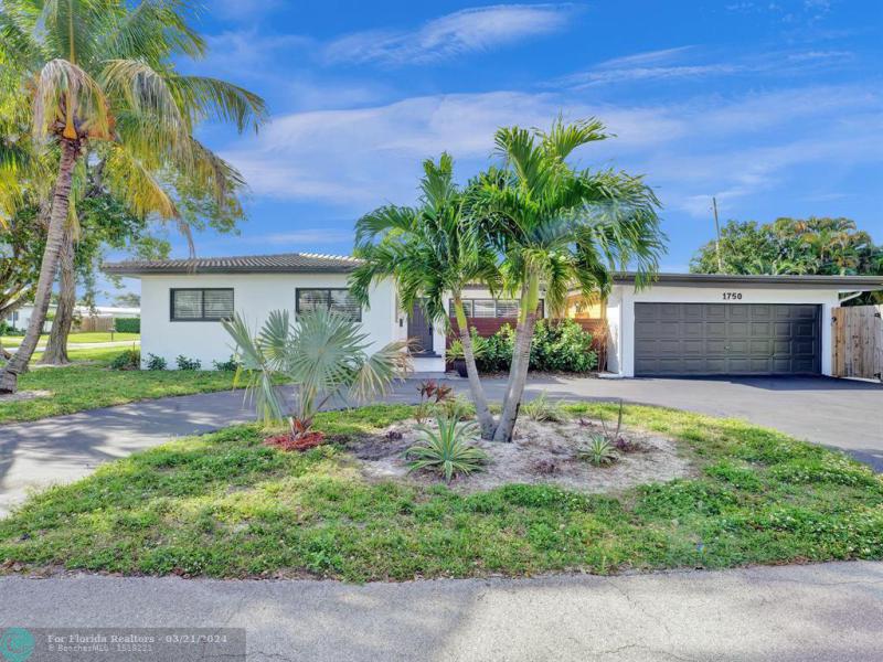First Photo for Home For Sale at 1750 NE 48th Ct Oakland Park, FL. 33334