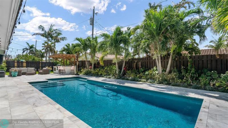 First Photo for Home For Sale at 2800 NE 53rd St Lighthouse Point, FL. 33064