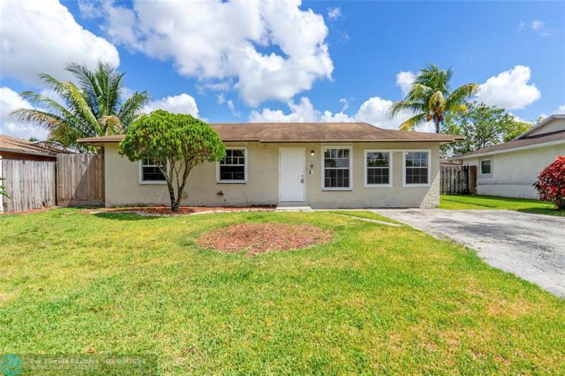 First Photo for Home For Sale at 8241 SW 7th St North Lauderdale, FL. 33068