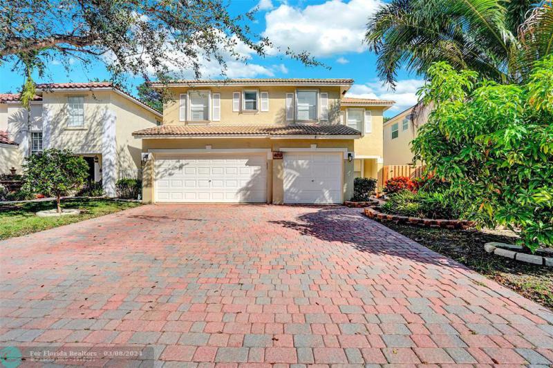 First Photo for Home For Sale at 4013 NW 63rd St Coconut Creek, FL. 33073