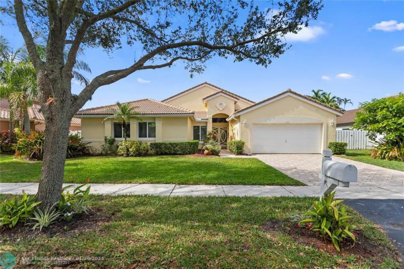 First Photo for Home For Sale at 823 NW 130th Ter Sunrise, FL. 33325