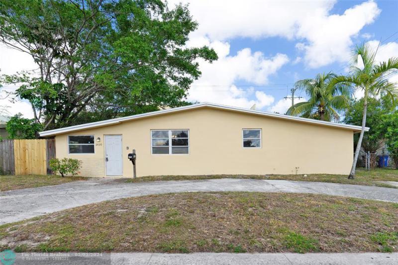 First Photo for Home For Sale at 3430 NW 43rd Ave Lauderdale Lakes, FL. 33319
