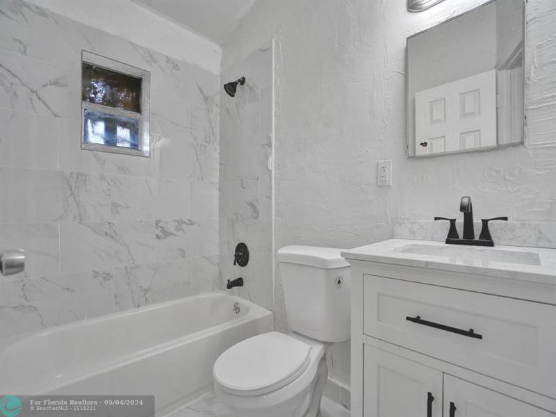 First Photo for Home For Sale at 2808 NW 4th St Pompano Beach, FL. 33069