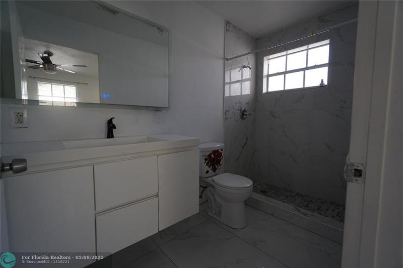  Single Family Homes Photo 13: 2035 NW 52nd St  Miami,  FL 33142