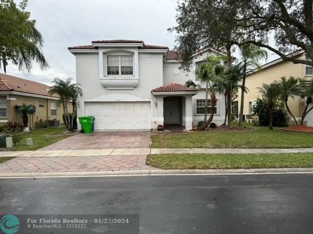 First Photo for Home For Sale at 2406 NW 138th Dr Sunrise, FL. 33323
