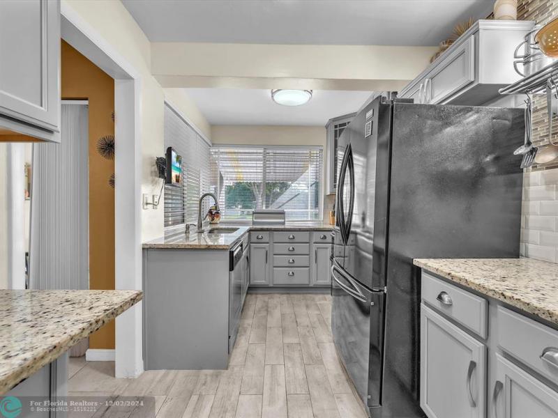  Single Family Homes Photo 9: 3354 NW 22nd St  Lauderdale Lakes,  FL 33311