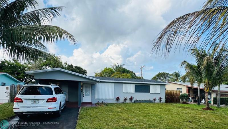 First Photo for Home For Sale at 4821 NW 13th Ct Lauderhill, FL. 33313
