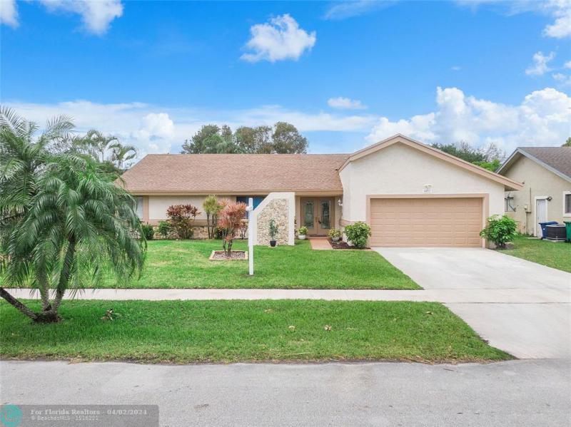 First Photo for Home For Sale at 4471 NW 74th Ave Lauderhill, FL. 33319