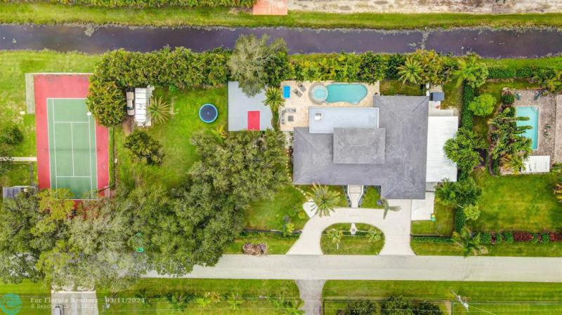 First Photo for Home For Sale at 11700 NW 6th St Plantation, FL. 33325