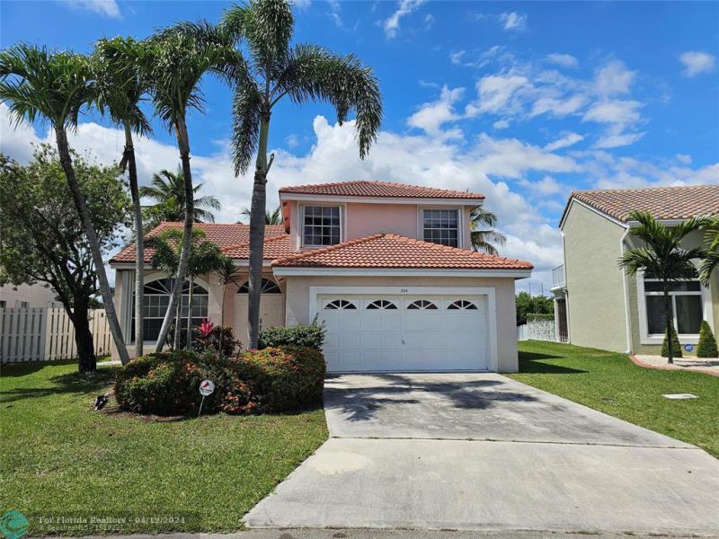 First Photo for Home For Sale at 324 SW 183rd Way Pembroke Pines, FL. 33029