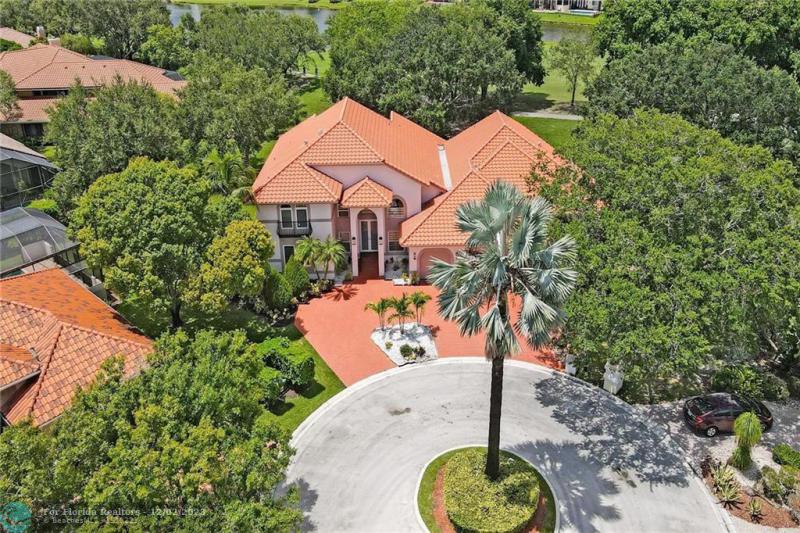 First Photo for Home For Sale at 1970  Las Colinas Way Coral Springs, FL. 33071