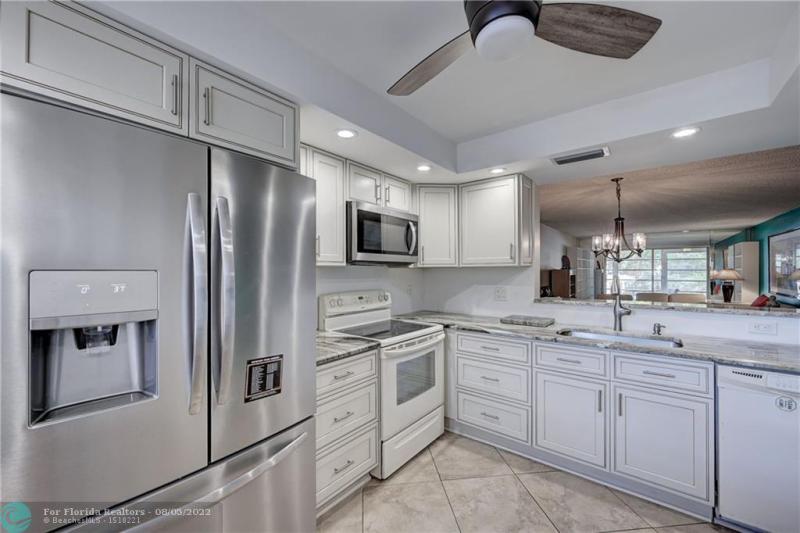 First Photo for Home For Sale at  Coconut Creek, FL. 33066