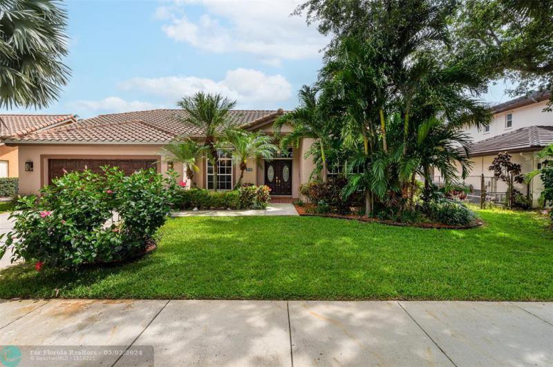  Single Family Homes Photo 2: 3950 NW 54th Ct  Coconut Creek,  FL 33073