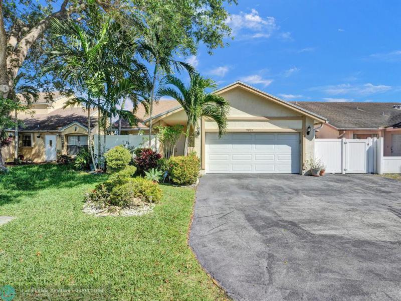 First Photo for Home For Sale at 7937 NW 50th St Lauderhill, FL. 33351