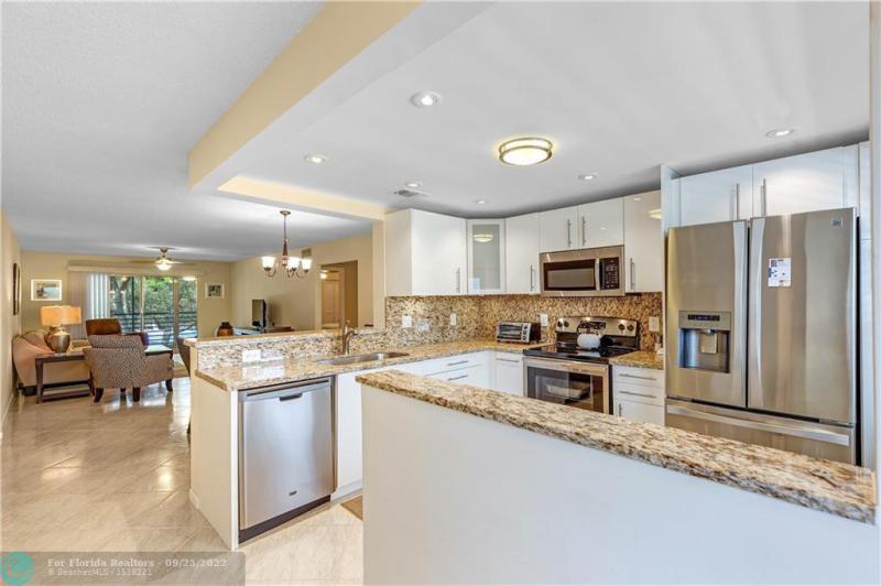 First Photo for Home For Sale at  Coconut Creek, FL. 33066