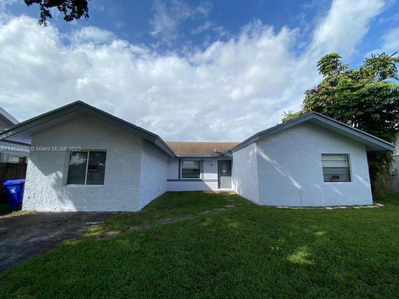 First Photo for Home For Sale at 8205 SW 12th Pl North Lauderdale, FL. 33068