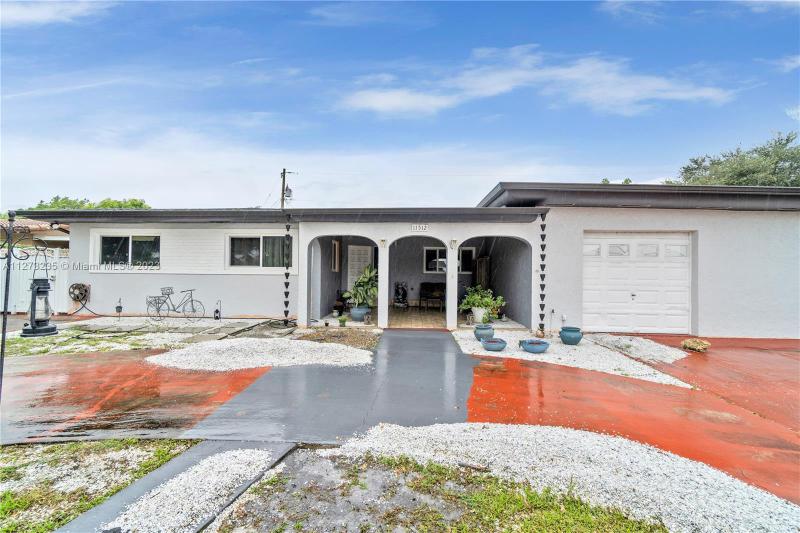First Photo for Home For Sale at 11512 NW 58th Ave Hialeah, FL. 33012