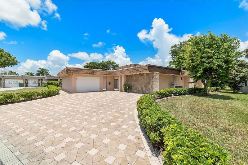 First Photo for Home For Sale at 6103  Royal Poinciana Ln Tamarac, FL. 33319