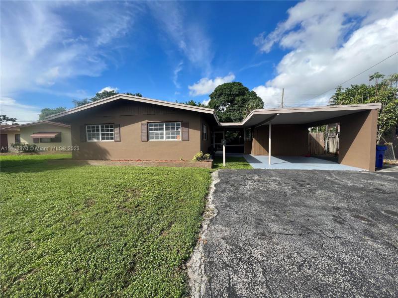 First Photo for Home For Sale at 4531 NW 32nd Ct Lauderdale Lakes, FL. 33319