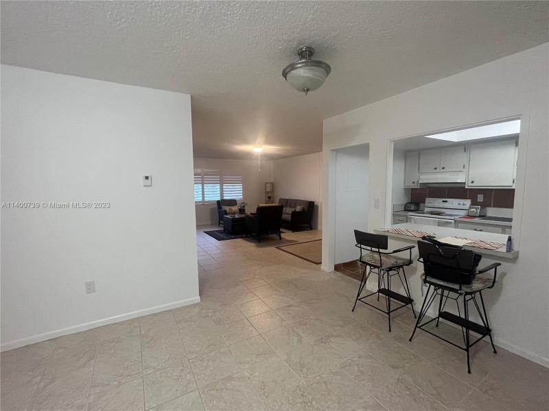 First Photo for Home For Sale at 1700 NE 105th St 310 Miami Shores, FL. 33138