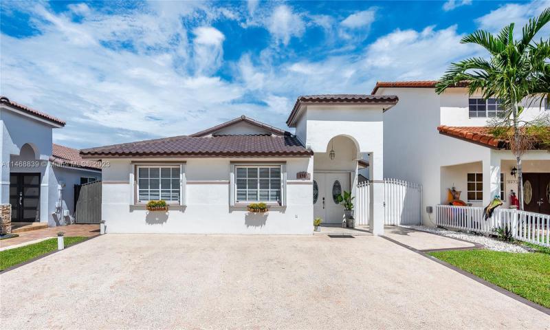 First Photo for Home For Sale at 8981 NW 112th St Hialeah Gardens, FL. 33018