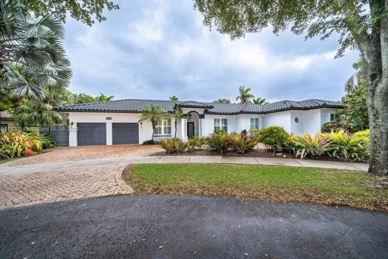 First Photo for Home For Sale at 15545 NW 82nd Pl Miami Lakes, FL. 33016