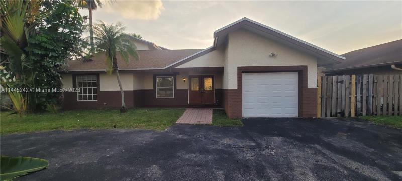 First Photo for Home For Sale at 1319 SW 83rd Ave North Lauderdale, FL. 33068