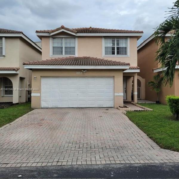 First Photo for Home For Sale at 3864 NW 67th Way Lauderhill, FL. 33319